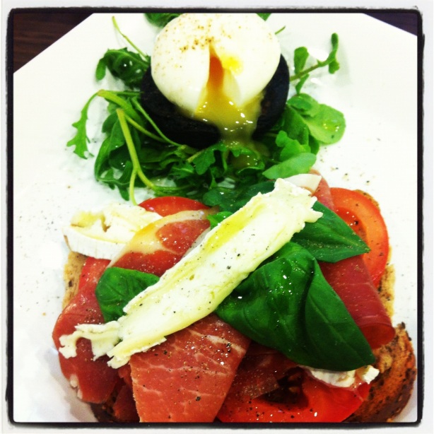 Serrano ham & Le Rustique Brie on a bed of tomatoes & basil. Side surprise of boiled egg on crispy black pudding & watercress.
